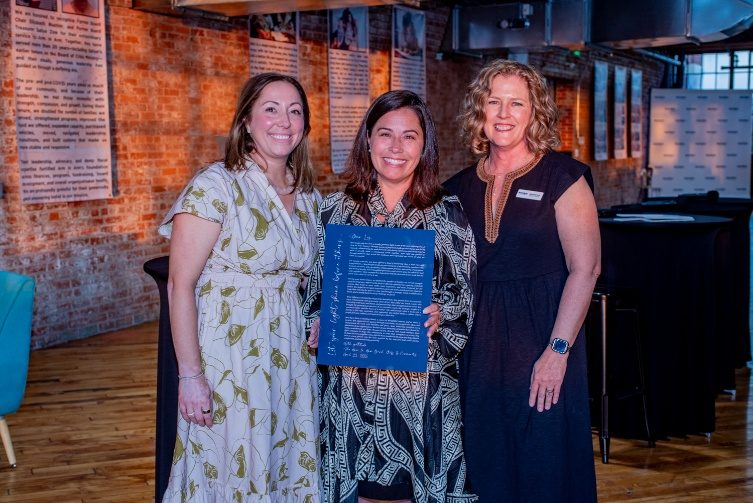 Honorees with an award at the spring benefit