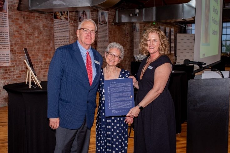 Honorees with an award at the spring benefit